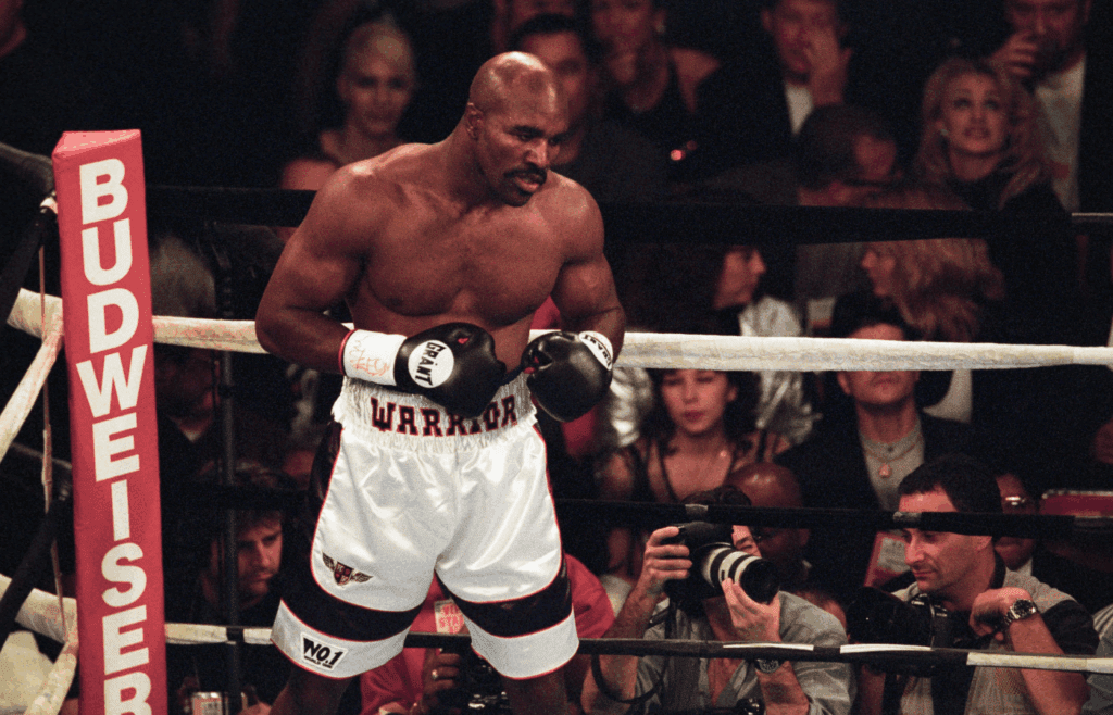 Nov 8, 1997, Las Vegas, NV; FILE PHOTO; Evander Holyfield (white shorts) against Michael Moorer (not shown) for the Heavy Weight Championship at the Mirage. Holyfield won in the 8th round by TKO. Mandatory Credit: V.J. Lovero-Imagn Images