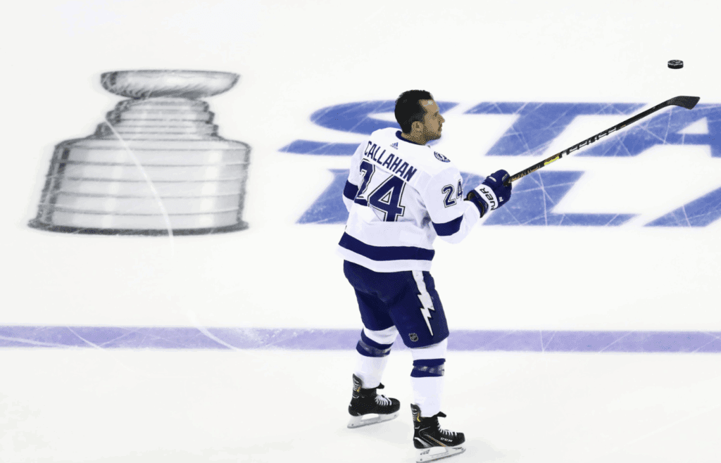 Apr 14, 2019; Columbus, OH, USA; Tampa Bay Lightning right wing Ryan Callahan (24) flips a puck during warmups prior to the game against the Columbus Blue Jackets in game three of the first round of the 2019 Stanley Cup Playoffs at Nationwide Arena. Mandatory Credit: Aaron Doster-Imagn Images
