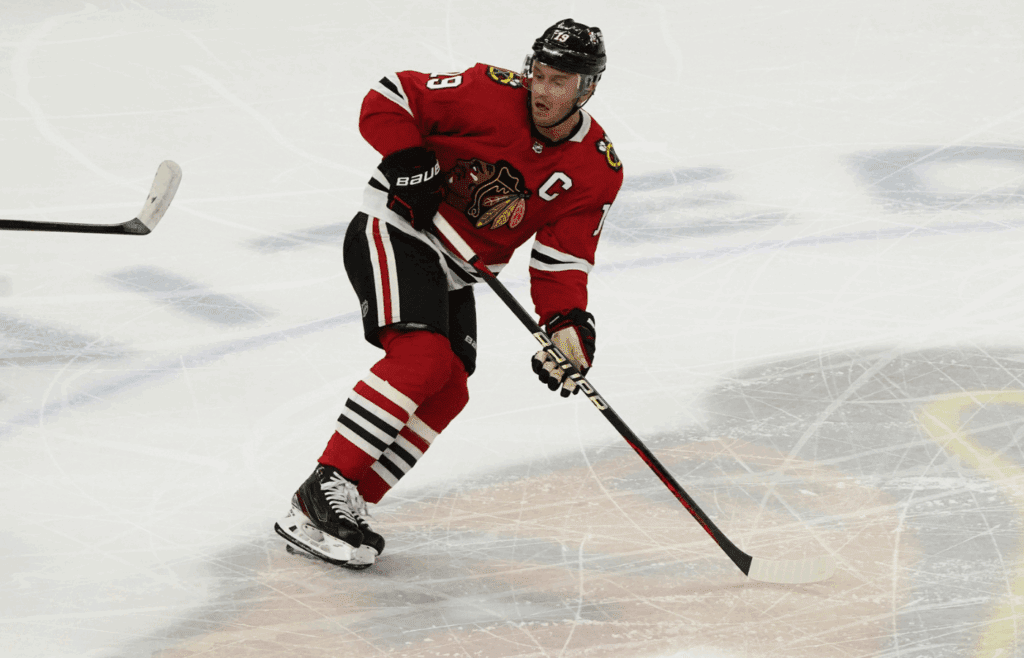 Apr 13, 2023; Chicago, Illinois, USA; Chicago Blackhawks center Jonathan Toews (19) plays in his last game as a Blackhawk against the Philadelphia Flyers during the first period at United Center. Mandatory Credit: David Banks-Imagn Images