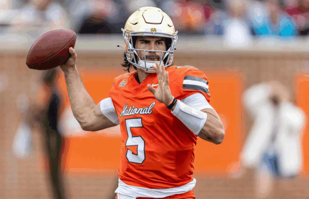 Feb 3, 2024; Mobile, AL, USA; National quarterback Sam Hartman of Notre Dame (5) throws the ball during the second half of the 2024 Senior Bowl football game at Hancock Whitney Stadium. Mandatory Credit: Vasha Hunt-Imagn Images