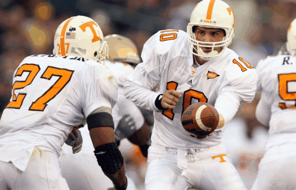 Nov. 5, 2005; South Bend, IN, USA; University of Tennessee Volunteers quarterback (10) Erik Ainge hands off the ball to tailback (27) Arian Foster at Notre Dame Stadium. Notre Dame Fighting Irish won 41-21. Mandatory Credit: Photo By Matt Cashore-Imagn Images Copyright (c) 2005 Matt Cashore