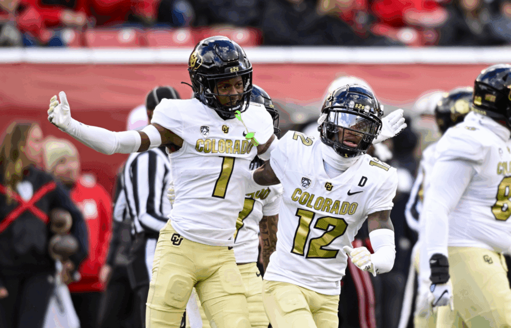 Nov 25, 2023; Salt Lake City, Utah, USA; Colorado Buffaloes athlete Travis Hunter (12) and cornerback Cormani McClain (1) react after a call against the Utah Utes at Rice-Eccles Stadium. Mandatory Credit: Christopher Creveling-Imagn Images