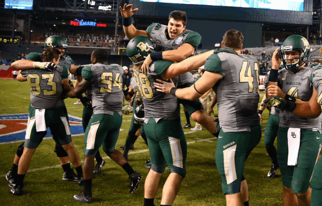 Dec 27, 2016; Phoenix, AZ, USA; Baylor Bears players celebrate on the field following the game against the Boise State Broncos during the Cactus Bowl at Chase Field. Baylor defeated Boise State 31-12. Mandatory Credit: Mark J. Rebilas-Imagn Images