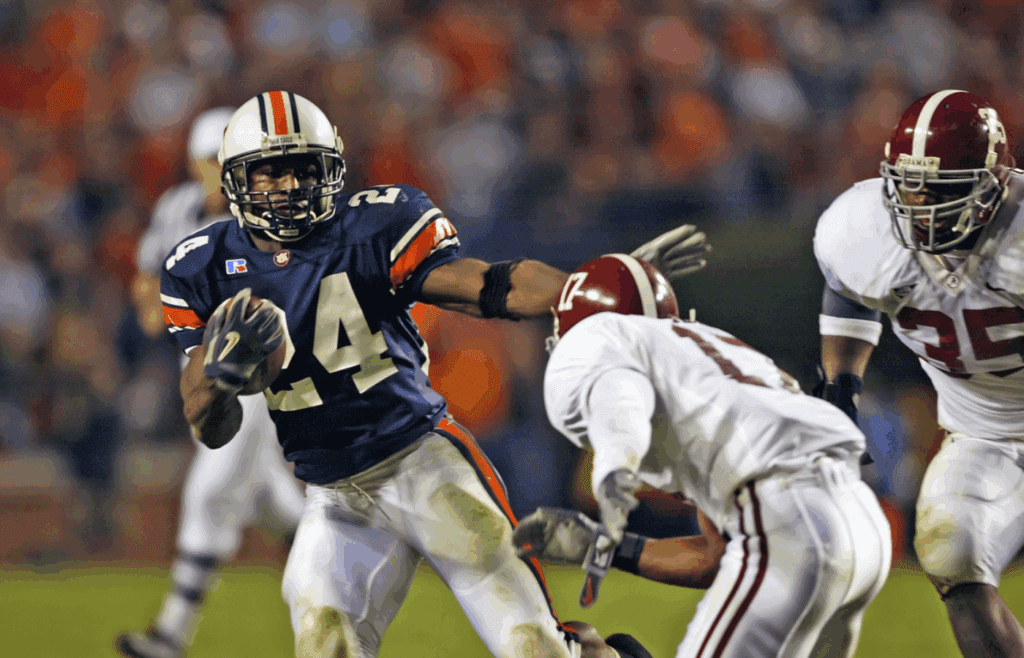 Nov 22, 2003; Auburn, AL, USA; FILE PHOTO; Auburn Tigers running back (24) Carnell Williams in action against the Alabama Crimson Tide at Jordan Hare Stadium. Mandatory Credit : Photo By Jason Parkhurst-Imagn Images