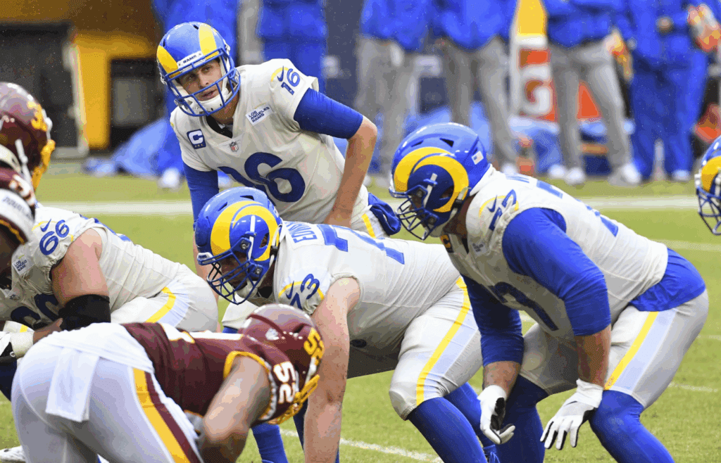 Oct 11, 2020; Landover, Maryland, USA; Los Angeles Rams quarterback Jared Goff (16) at the line of scrimmage against the Washington Football Team during the second half at FedExField. Mandatory Credit: Brad Mills-Imagn Images
