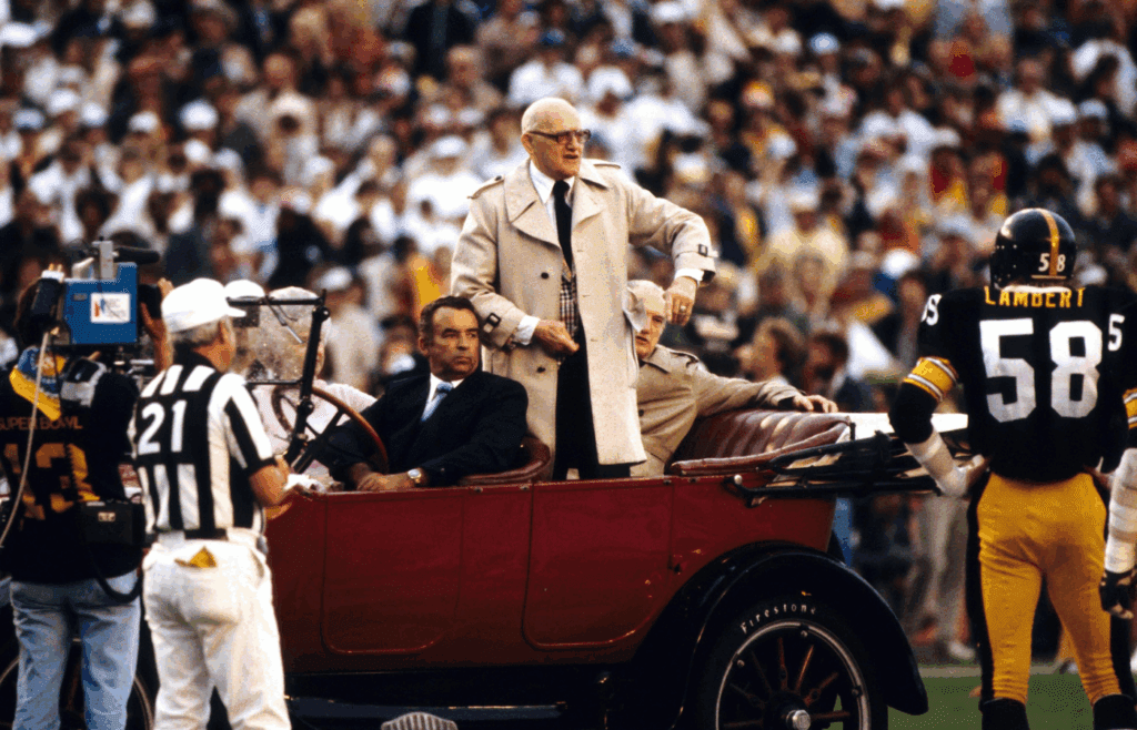 Jan 21, 1979; Miami, FL, USA; FILE PHOTO; Chicago Bears former head coach George Halas prepares to toss the coin for Super Bowl XIII between the Pittsburgh Steelers and the Dallas Cowboys. The Steelers defeated the Cowboys 35-31. Mandatory Credit: Photo By Malcolm Emmons- Imagn Images © Copyright Malcolm Emmons