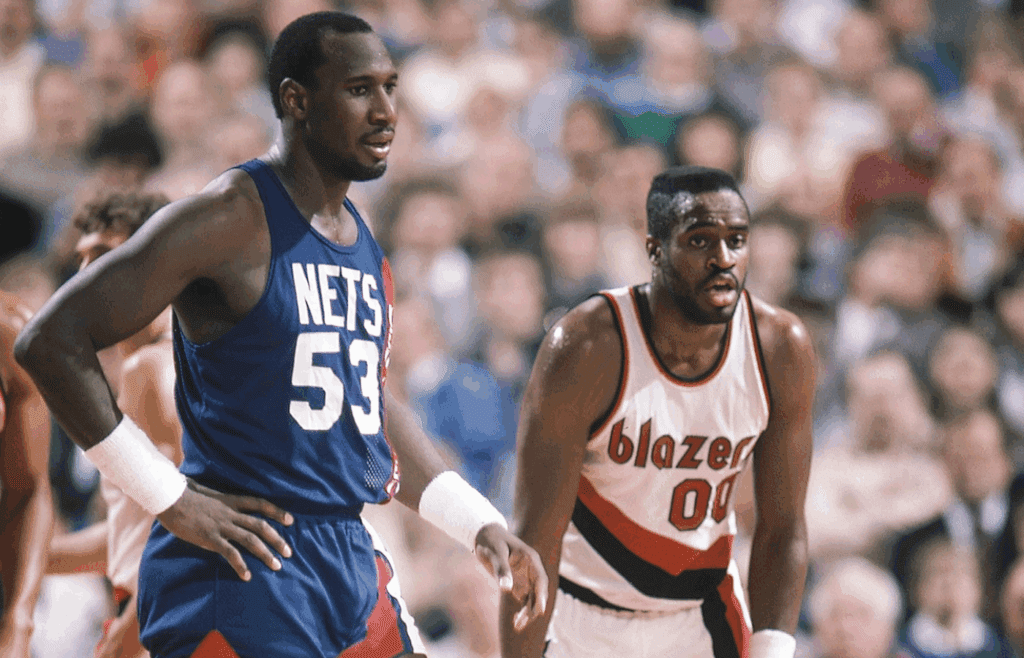Unknown date 1985; Portland, OR, USA: FILE PHOTO; New Jersey Nets center Darryl Dawkins (53) stands next to Portland Trail Blazers forward Ken Johnson (00) during the 1985 season at Memorial Coliseum. Mandatory Credit: RVR Photos-Imagn Images