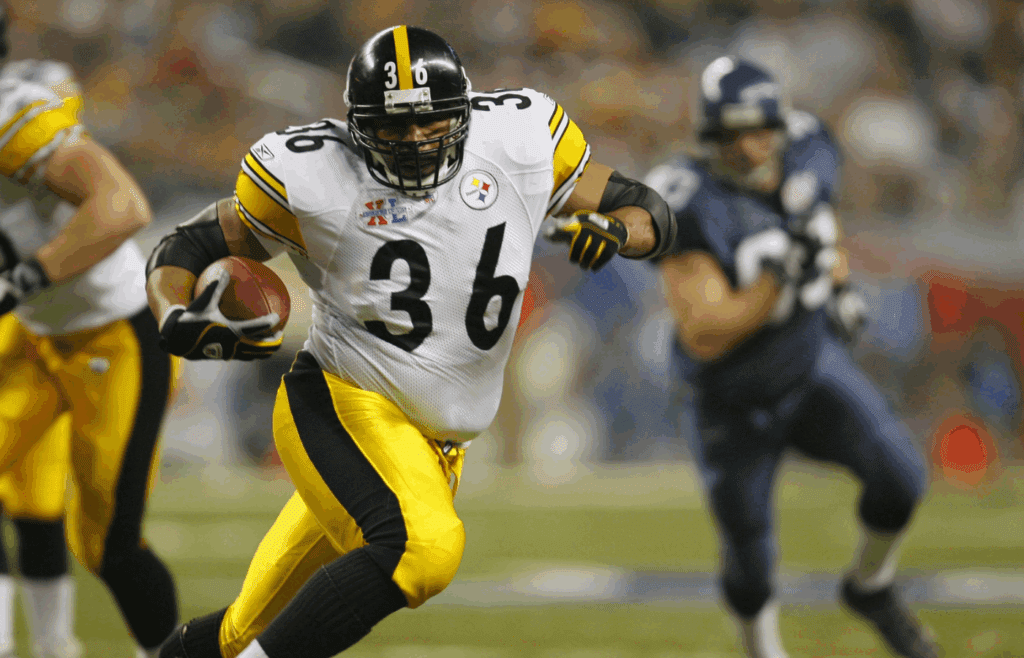 Feb 5, 2006; Detroit, MI, USA; Pittsburgh Steelers running back Jerome Bettis runs the ball during Super Bowl XL against the Seattle Seahawks at Ford Field. Mandatory Credit: John David Mercer-Imagn Images Copyright © 2006 John David Mercer