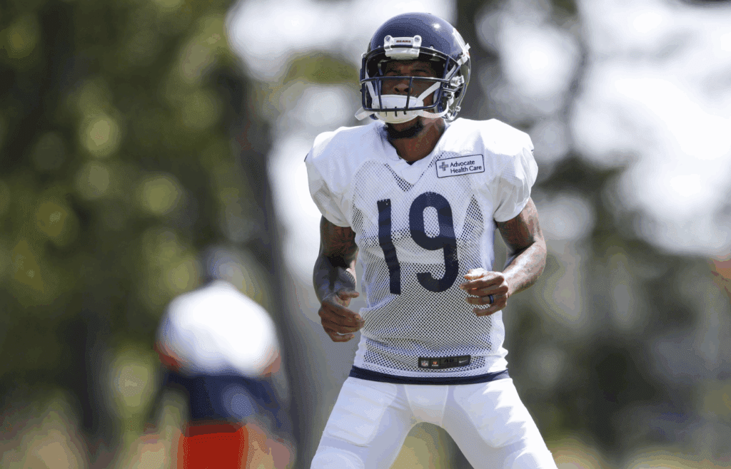 Aug 22, 2020; Lake Forest, Illinois, USA; Chicago Bears wide receiver Ted Ginn Jr. (19) warms up during training camp at Halas Hall. Mandatory Credit: Kamil Krzaczynski-Imagn Images