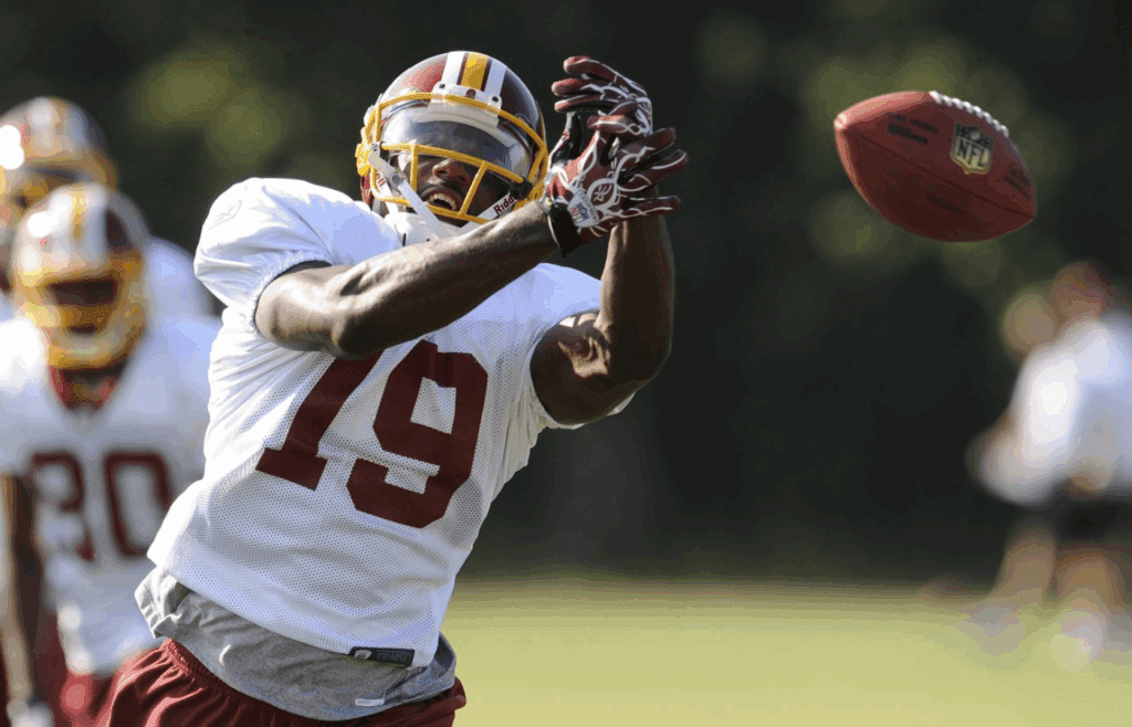 Aug 8, 2011; Ashburn, VA, USA; Washington Redskins wide receiver Donte Stallworth (19) reaches out for a pass during training camp at Redskins Park. Mandatory Credit: Rafael Suanes-Imagn Images