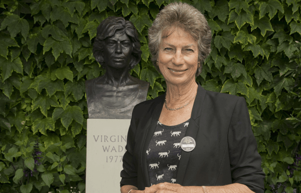 Jun 28, 2014; London, United Kingdom; Virginia Wade poses for a photo in front of her bust after being presented with her International Tennis Hall of Fame ring on day six of the 2014 Wimbledon Championships at the All England Lawn and Tennis Club. Mandatory Credit: Susan Mullane-Imagn Images