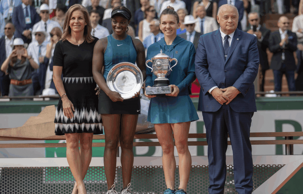 Jun 9, 2018, Paris, France: Arantxa Sanchez Vicario (ESP), Sloane Stephens (USA), Simona Halep (ROU) and FFT President, Bernard Giudicelli pose at the trophy presentation after the women's final on day 14 of the 2018 French Open at Roland Garros. Mandatory Credit: Susan Mullane-Imagn Images