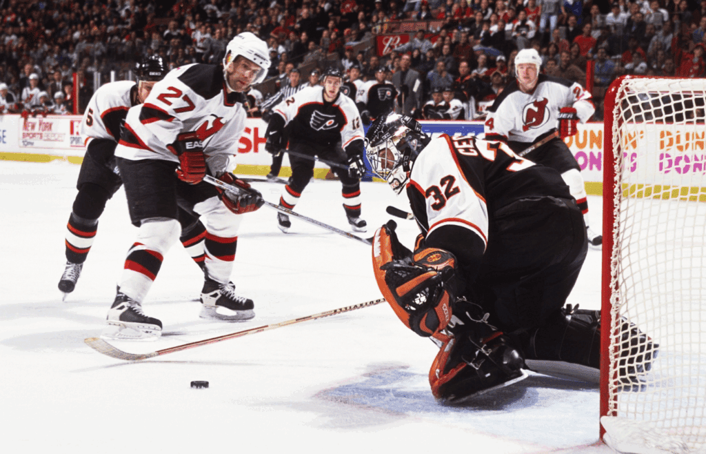 Unknown Date, 2001; East Rutherford, NJ, USA; FILE PHOTO; New Jersey Devils defensemen Scott Niedermayer (27) and Turner Stevenson (24) in action against Philadelphia Flyers goalie Roman Cechmanek (32), Kim Johnsson (5) and Simon Gagne (12) at Continental Airlines Arena. Mandatory Credit: Lou Capozzola-USA TODAY NETWORK