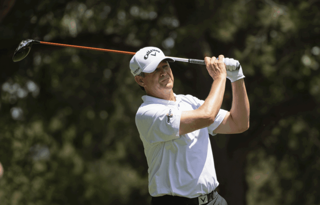 Jun 28, 2018; Colorado Springs, CO, USA; Lee Janzen watches his tee shot at 14 during the first round of the U.S. Senior Open golf tournament at the Broadmoor. Mandatory Credit: Michael Madrid-Imagn Images