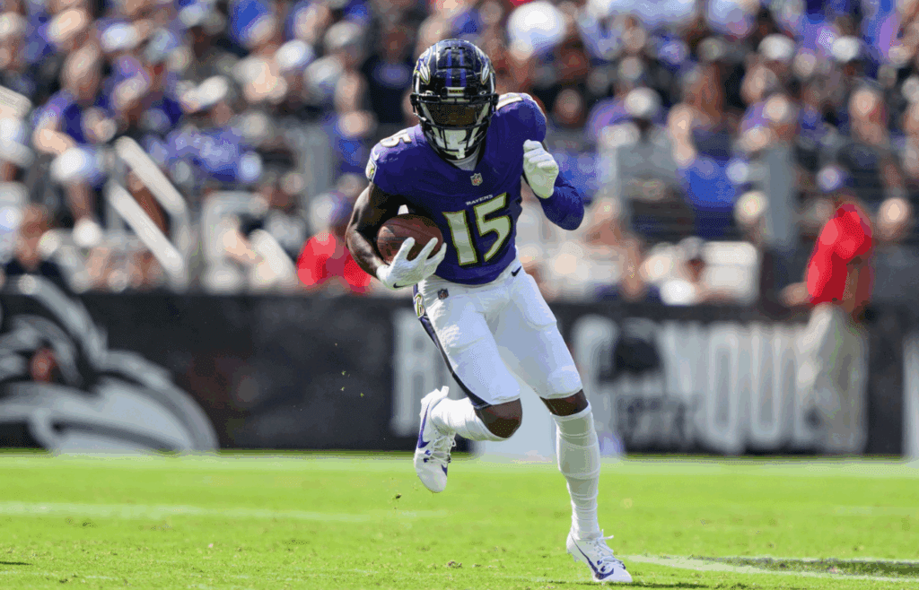 Sep 15, 2024; Baltimore, Maryland, USA; Baltimore Ravens wide receiver Nelson Agholor (15) runs with the ball during the second half against the Las Vegas Raiders at M&T Bank Stadium. Mandatory Credit: Reggie Hildred-Imagn Images