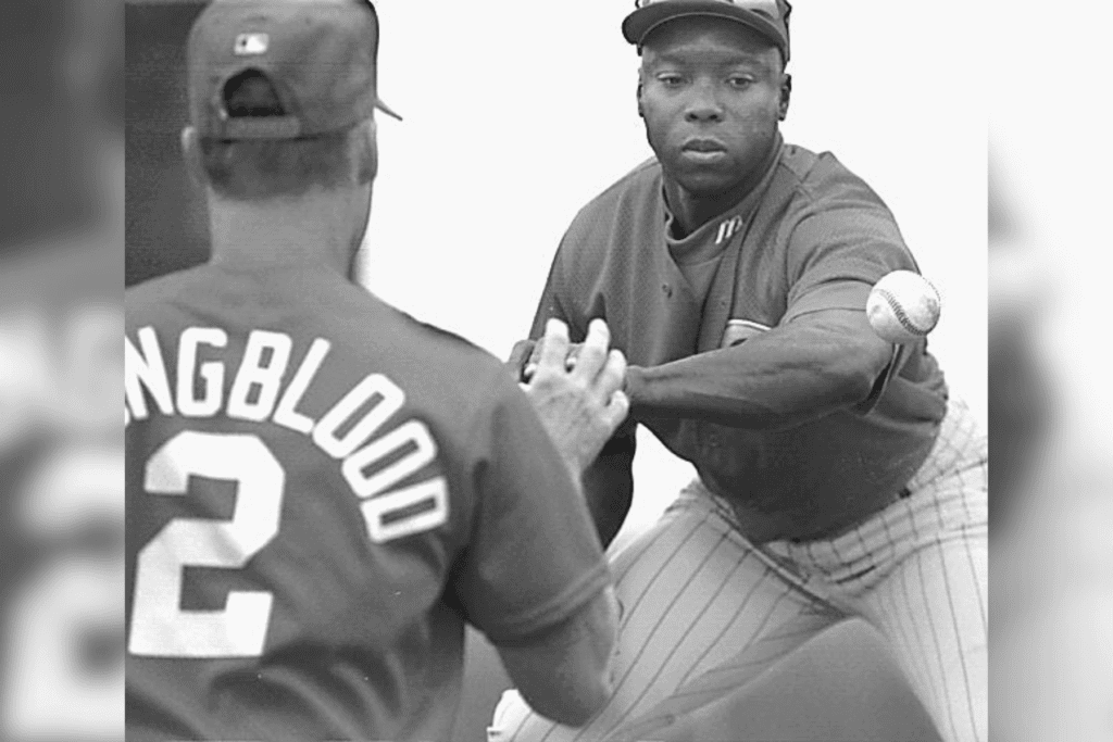 Text: spring train-coleman-smh 2/22/96--coleman--reds outfielder vince coleman does what coach joel youngblood (left) calls a \"quick hand drill\" during spring training in plant city thursday. Text Spring Train Coleman Smh 2 22 96 Coleman Reds Outfielder Vince Coleman Does What Coach Joel Youngblood Left Calls A Quick Hand Drill During Spring Training In Plant City Thursday