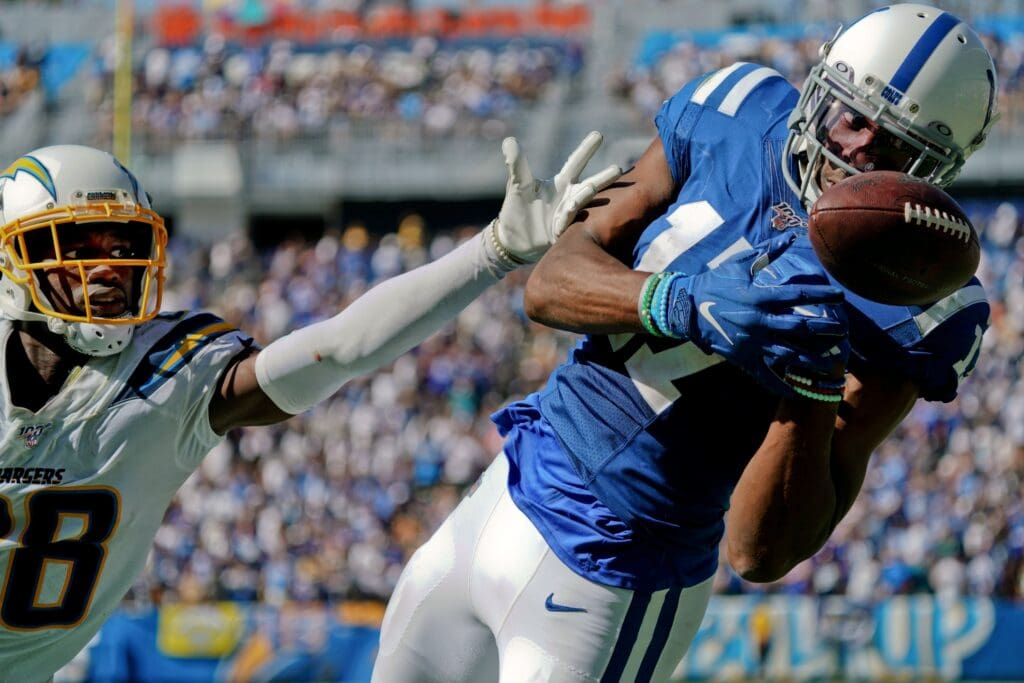 Sep 8, 2019; Carson, CA, USA; Indianapolis Colts wide receiver Devin Funchess (17) leaps for a pass against Los Angeles Chargers defensive back Brandon Facyson (28) during the second half at Dignity Health Sports Park. Mandatory Credit: Kirby Lee-USA TODAY Sports