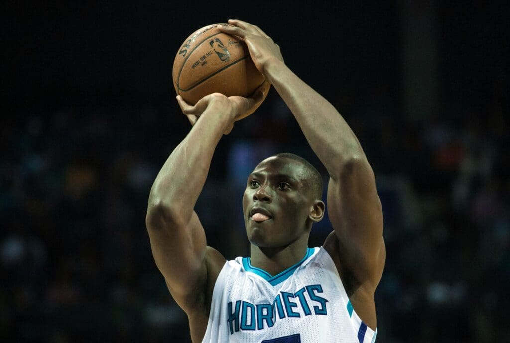Mar 11, 2015; Charlotte, NC, USA;  Charlotte Hornets center Bismack Biyombo (8) shoots a free throw during the second half against the Sacramento Kings at Time Warner Cable Arena. The Kings defeated the Hornets 113-106. Mandatory Credit: Jeremy Brevard-USA TODAY Sports